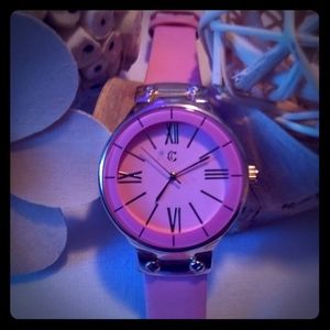 Pink and stainless steel watch